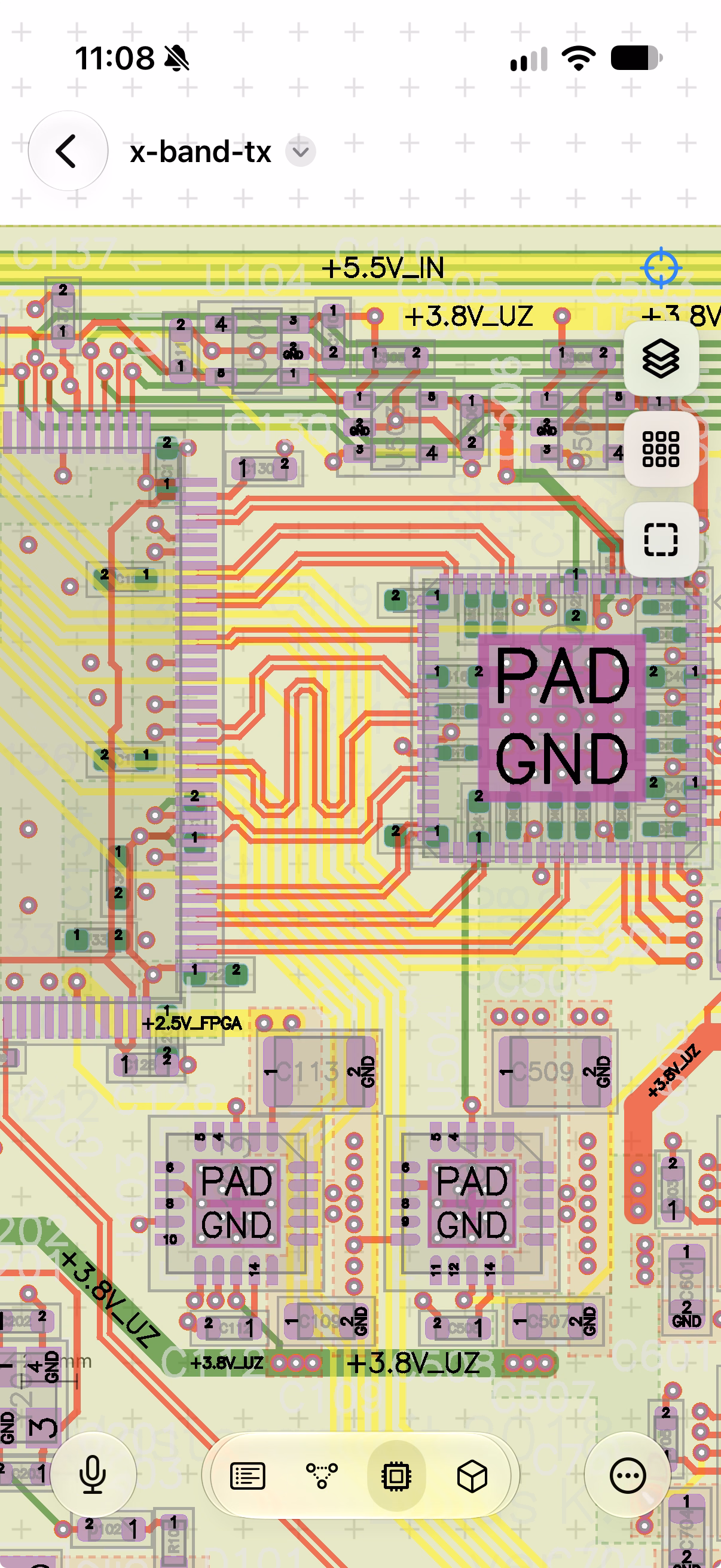 The board on iPhone, zoomed in on a QFN and its decoupling capacitors